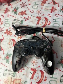 GameStop-branded clear corded USB controller, commonly known as the GameStop Afterglow Pro Wired Controller (or similar third-party variant) designed