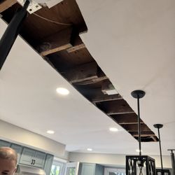Ceiling Raised  installed new beam