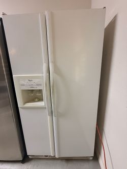 Title: Whirlpool Side-by-Side Refrigerator with Water/Ice Dispenser - Works Great!