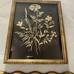 Gold and black wall framed art