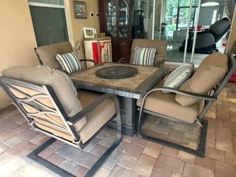 5 piece patio set 4 chairs and table with fire feature