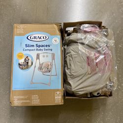New Open Graco Slim Spaces Baby Swing Compact Carry Handle Foldable Adjustable Speeds