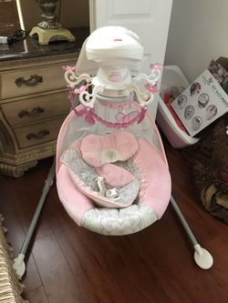 Pink chandelier lights and music Infant Swing