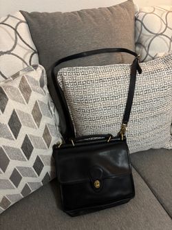 Vintage black leather coach