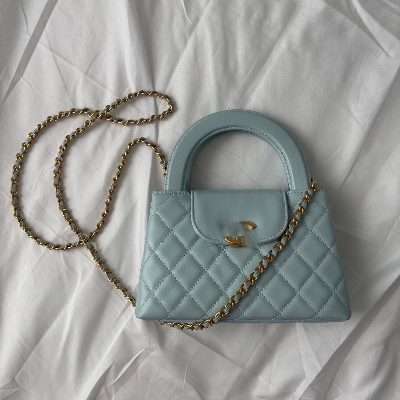 light blue quilted mini bag with gold chain strap(162)54