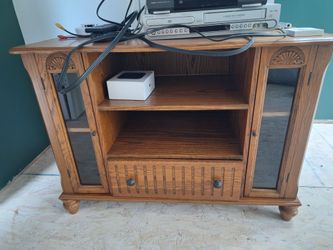 Older solid TV stand