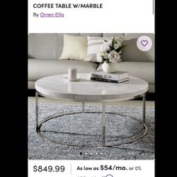 CB2 marble coffee table