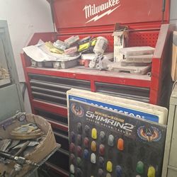 One milwaukee tool box fill with tools