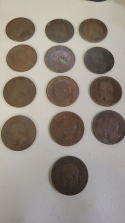 The highlighted object appears to be a vintage 1854 or 1853+ French bronze coin featuring the profile portrait of Napoleon III (Emperor of the French)
