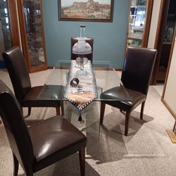 Glass table and leather chairs(7 pieces total)