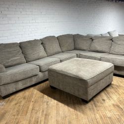 Delivery Available Ashley L shape sectional couch and ottoman