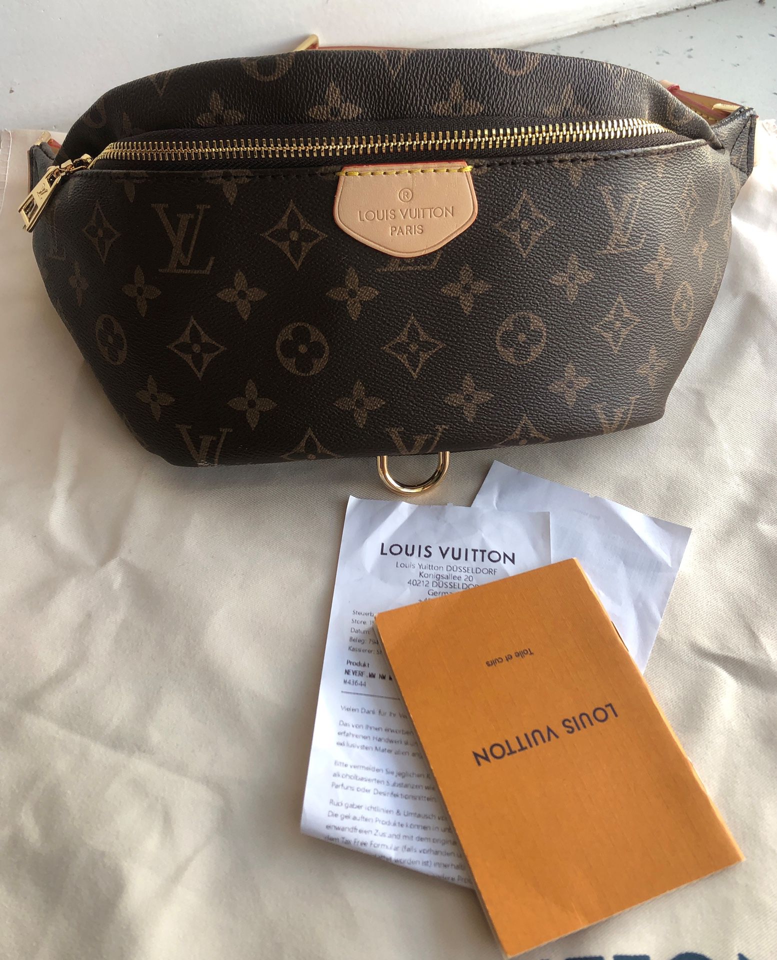 Authentic Louis Vuitton mongram canvas brown leather belt bag