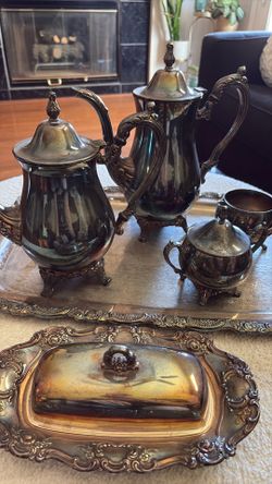 Silver plated tea set with 2 tea pots, sugar, cream,  butter dish and tray