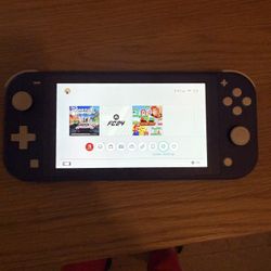 Nintendo Switch Lite Handheld Console - Blue ( Plus 7 Games Included)