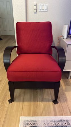 Red Upholstered Accent Chair with Dark Wood Frame