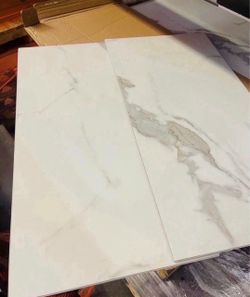 Carrara Luciano 11.81 in. W x 23.62 in. L Rigid Core Click Lock Luxury Vinyl Tile Flooring (19.37 sq. ft./case)