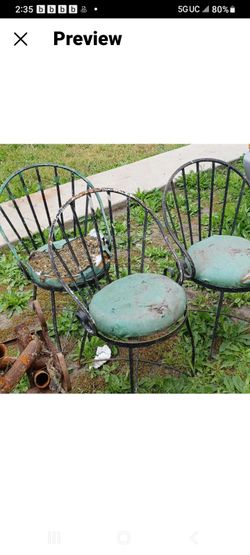 TABLE AND VINTAGE CHAIRS 