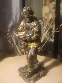 Firemen Saving A Child Sculpture 