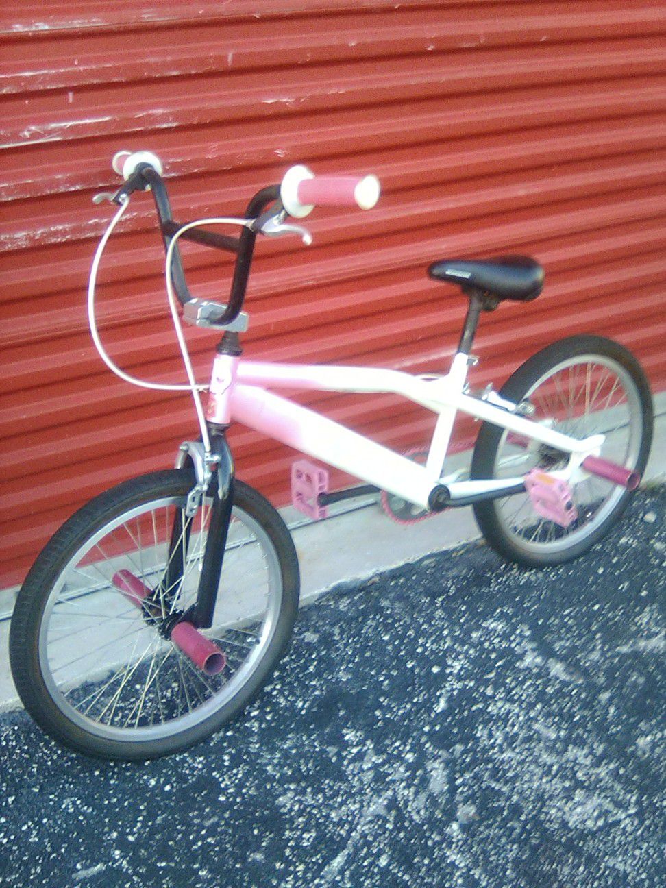 Custom painted and built pink white pearl BMX bike