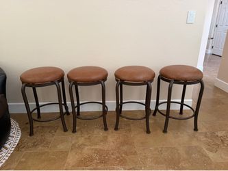 4 padded Bar stools - excellent condition