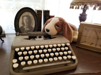 Vintage typewriter with leather case