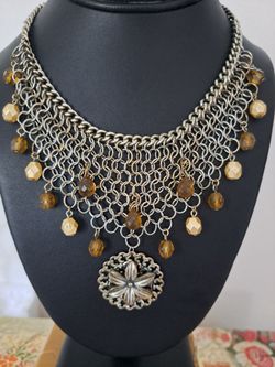Silvertone chainmail choker with amber  colored beads