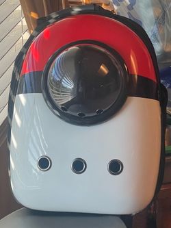 poké ball-themed pet carrier backpack