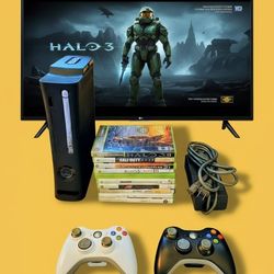 Microsoft Xbox 360 with 2 controllers 10 games power supply