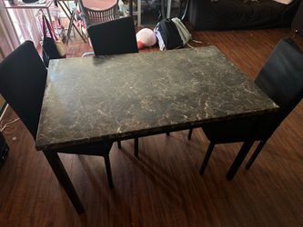 Dining room table and chairs set
