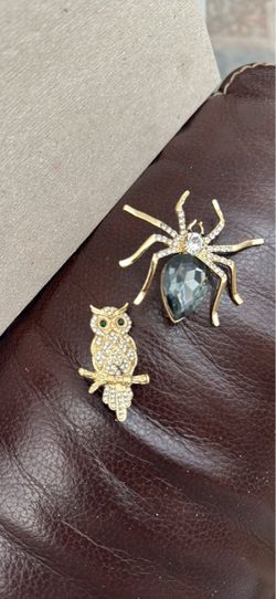 Two Brooches