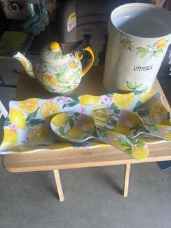 Set of Tea Pot, countertop utensils, player, spoon and fork