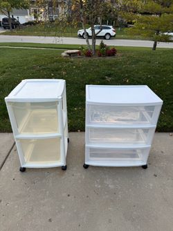 Two storage organizer cabinets on wheels