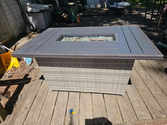 Price is firm.. beautiful large gas fire pit table