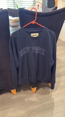 Navy blue, New York sweatshirt size XL.