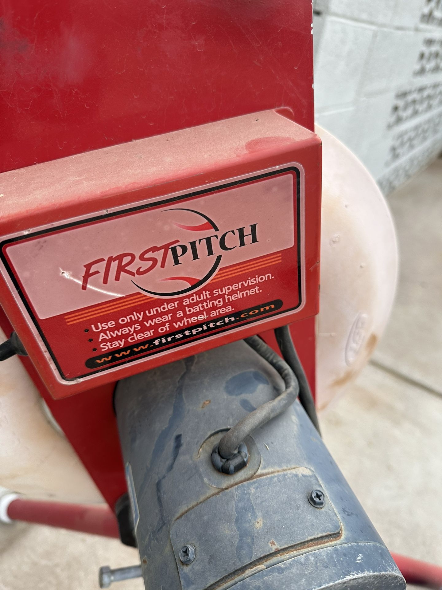 First pitch pitching machine