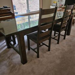 Dark Wood Dining Table with Custom Glass Top, Bench, And Chairs