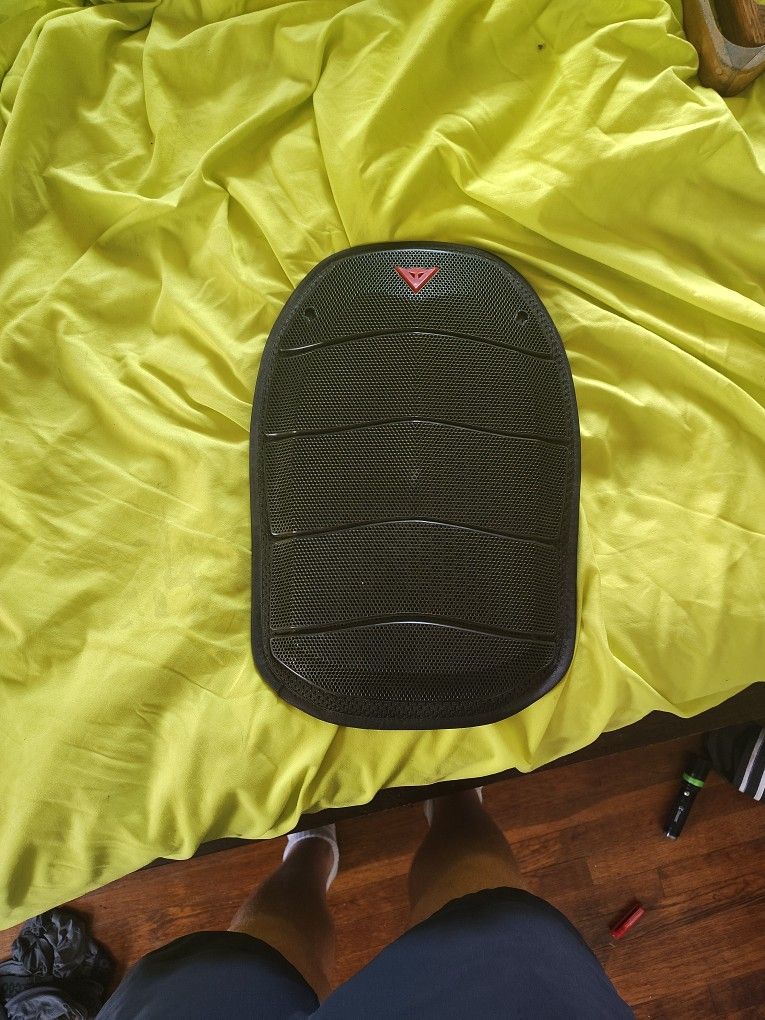 Upgrade your motorcycle gear with the Dainese Shield Air G2 Level 2 Back Protector. This unisex adult back protector is designed with vented technolog