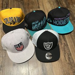 New Era snapbacks. 