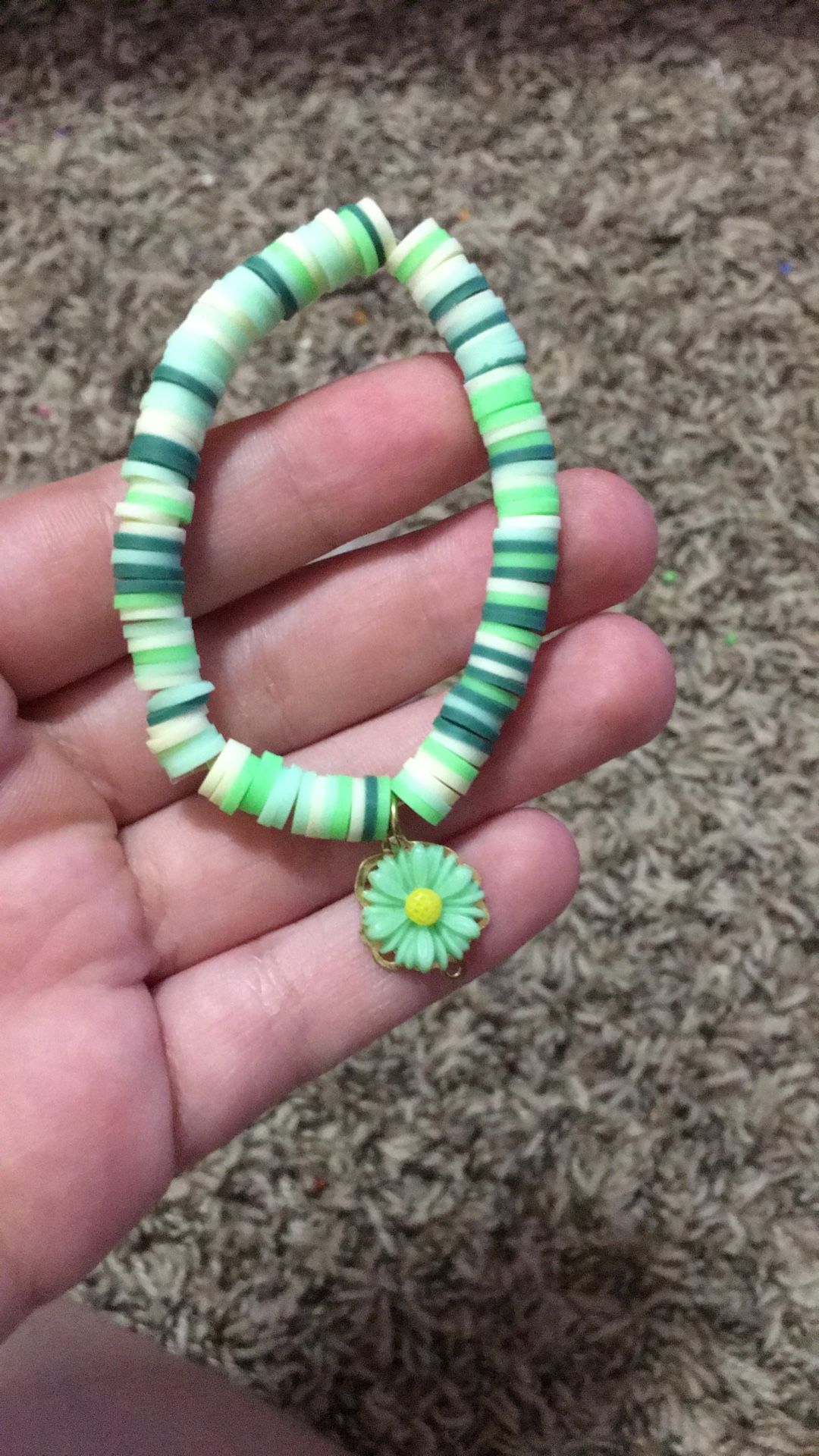 Cute Green Clay Bead Bracelet With A Green Flower Charm 