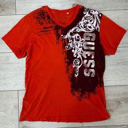 Vintage Guess men's V-neck T-shirt features a bold graphic design
