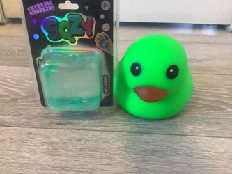 Squishy green duck & SQZY ice burg cube