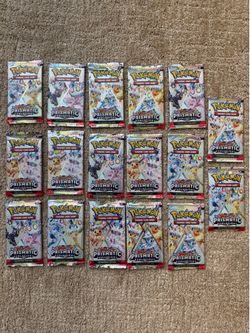 Pokémon Prismatic Evolutions Booster Packs – 17 Sealed Packs