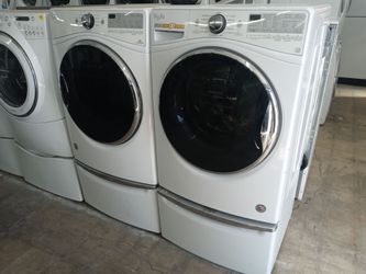 Whirlpool front load washer and dryer set on pedestals - Free delivery