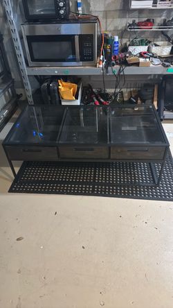 Glass table with storage
