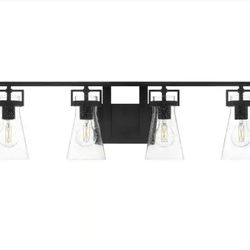 Home Decorators Collection
Clermont 30.75 in. 4-Light Matte Black Bathroom Vanity Light with Seeded Glass Shades