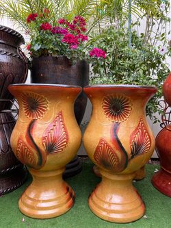 Clay pots 27” H. 15” W.
