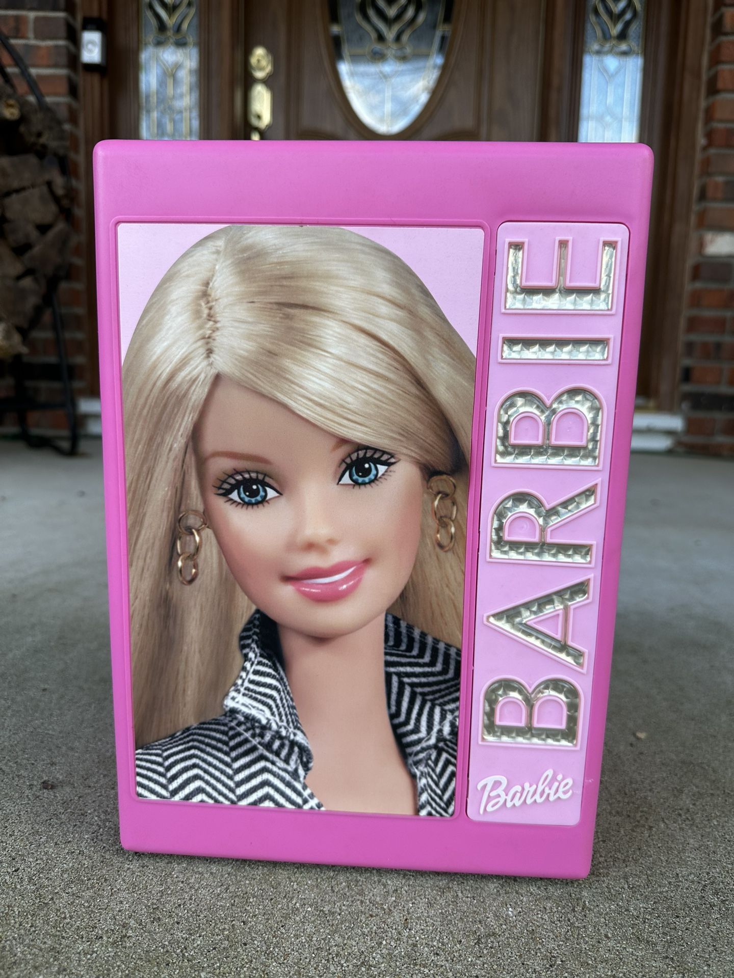 Barbie Doll Trunk. Excellent condition. Doll holders, closet bar for hanging clothes and 3 storage bins