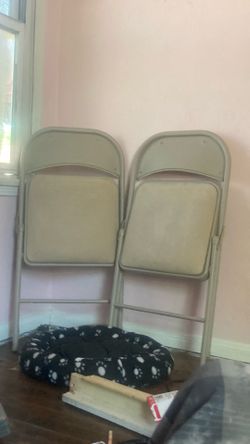 2 matching suede folding chairs