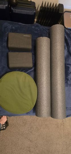 Yoga blocks, foam rollers, and Zafu meditation cushion