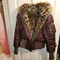 Reversible Jacket.  Shiny Brown With Alot Of Pockets. Fur On Other Side